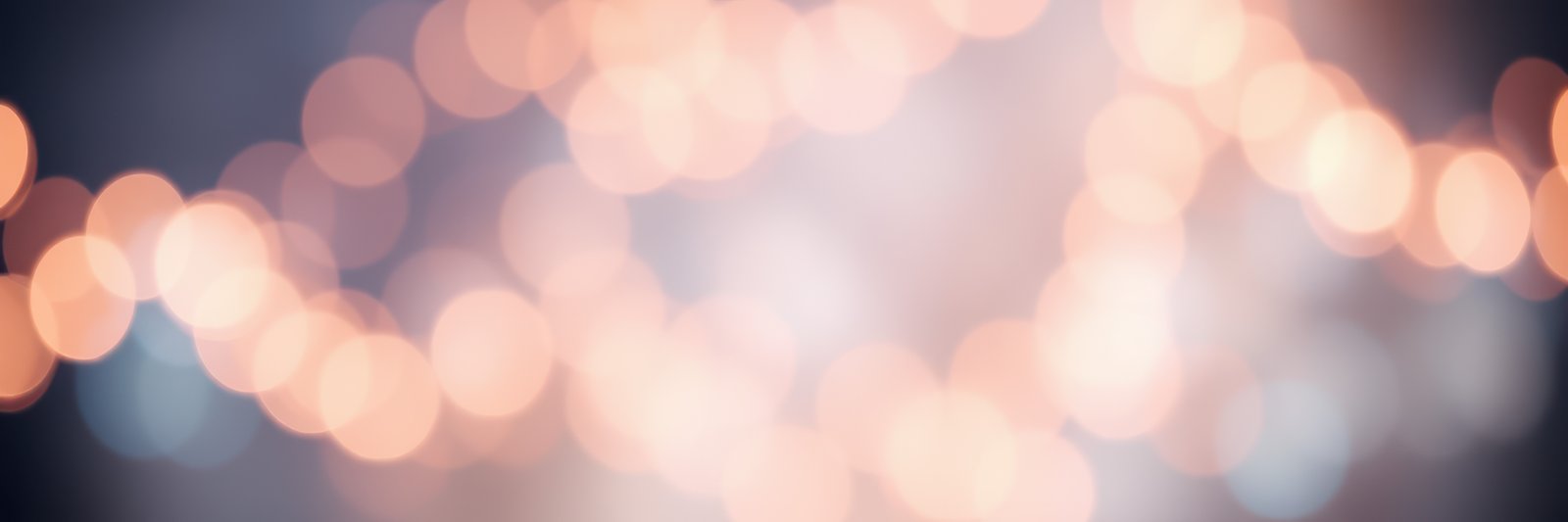 Soft bokeh lights create a dreamy atmosphere for evening gatherings and celebrations in a cozy setting